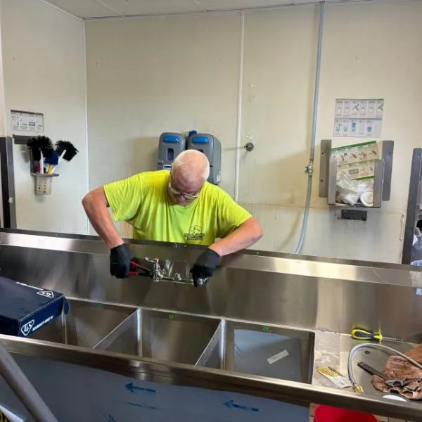 Commercial sink installation in a restaurant kitchen